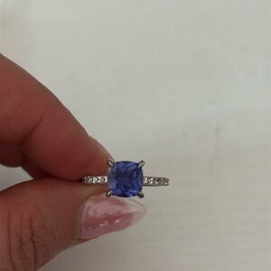 Elegant Tanzanite and White Sapphire Silver ring